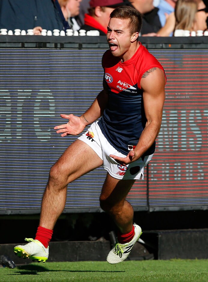 AFL 2016 Rd 04 - Collingwood v Melbourne MELBOURNE, AUSTRALIA - APRIL 17: Ben Kennedy of the Demons celebrates a goal during the 2016 AFL Round 04 match between the Collingwood Magpies and the Melbourne Demons at the Melbourne Cricket Ground, Melbourne on April 17, 2016. (Photo by Adam Trafford/AFL Media)